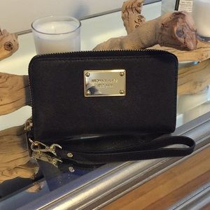 Michael Kors clutch never used
